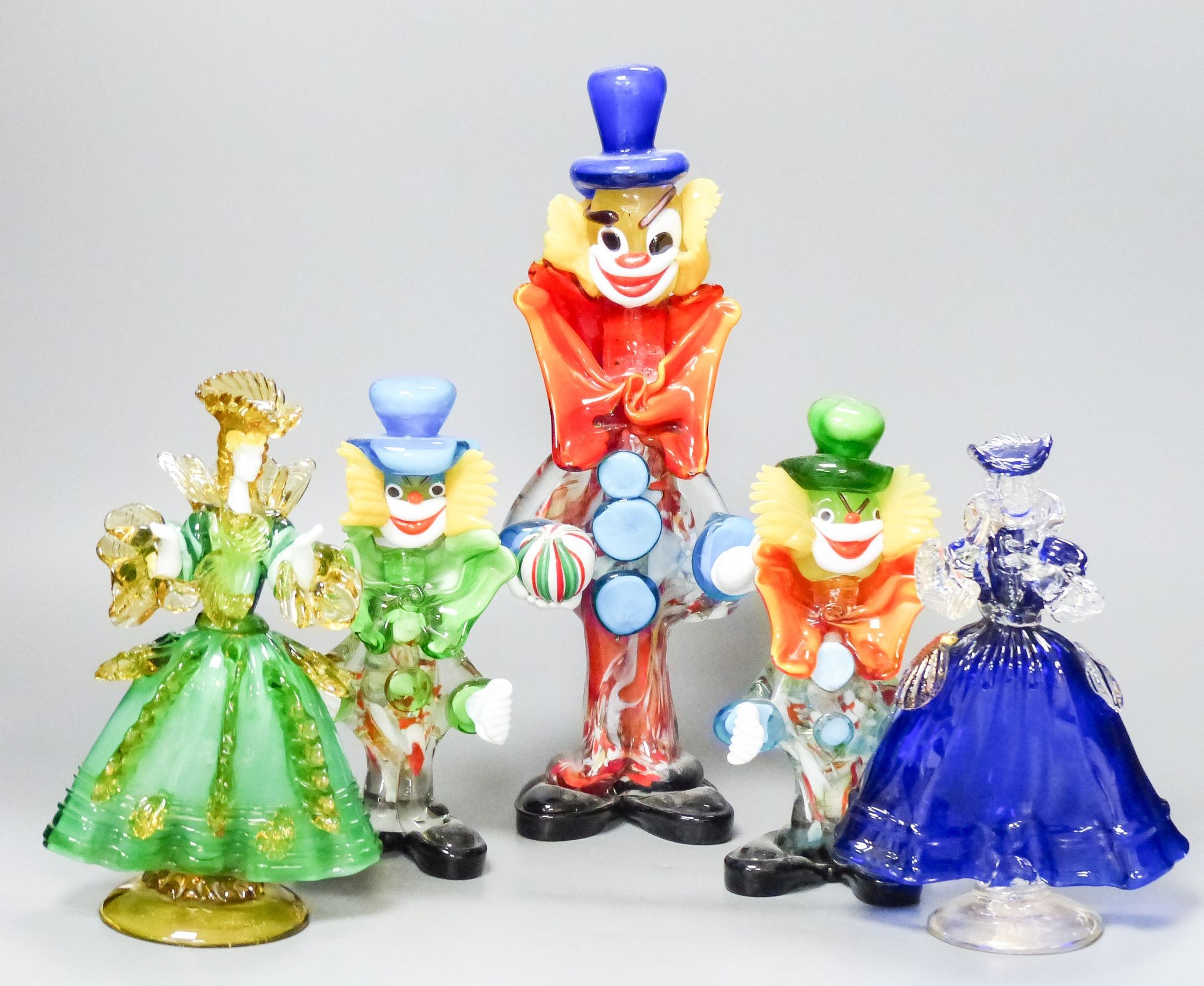 Three Murano glass figures of clowns and two similar figures of ladies, tallest 34 cm